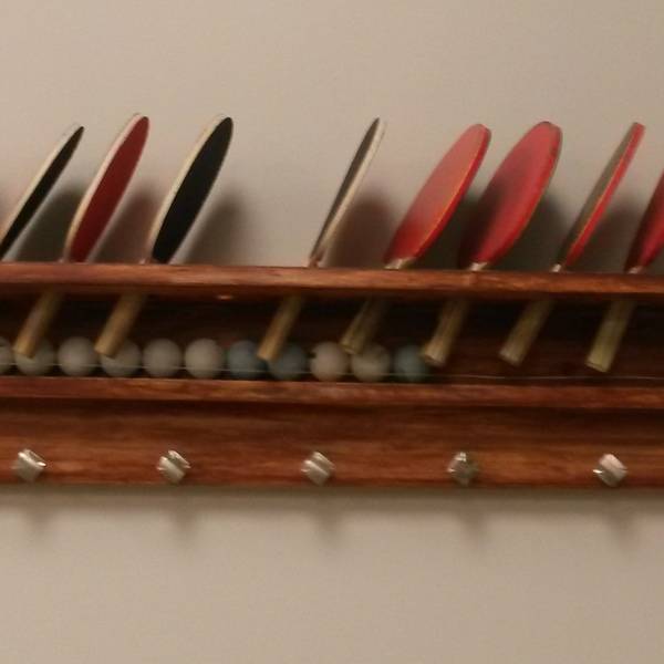 Photo: Ping Pong Accessory and Coat Rack