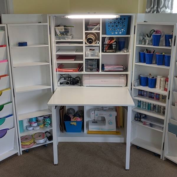 storage cabinet with hidden desk