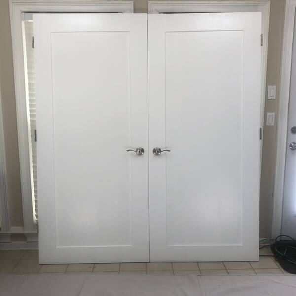 Photo: Double tool closet doors with built-on storage