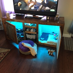 entertainment center with dog crate